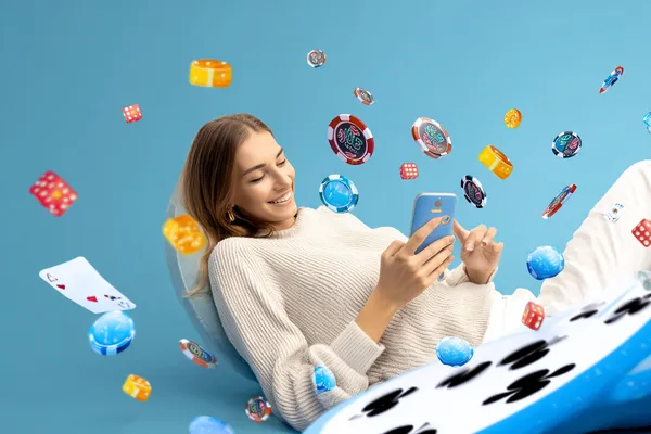 OMGBT — A high-class gaming experience without limits A woman in a luxurious green gown next to an ornate roulette wheel, capturing the upscale casino mood of OMGBT.